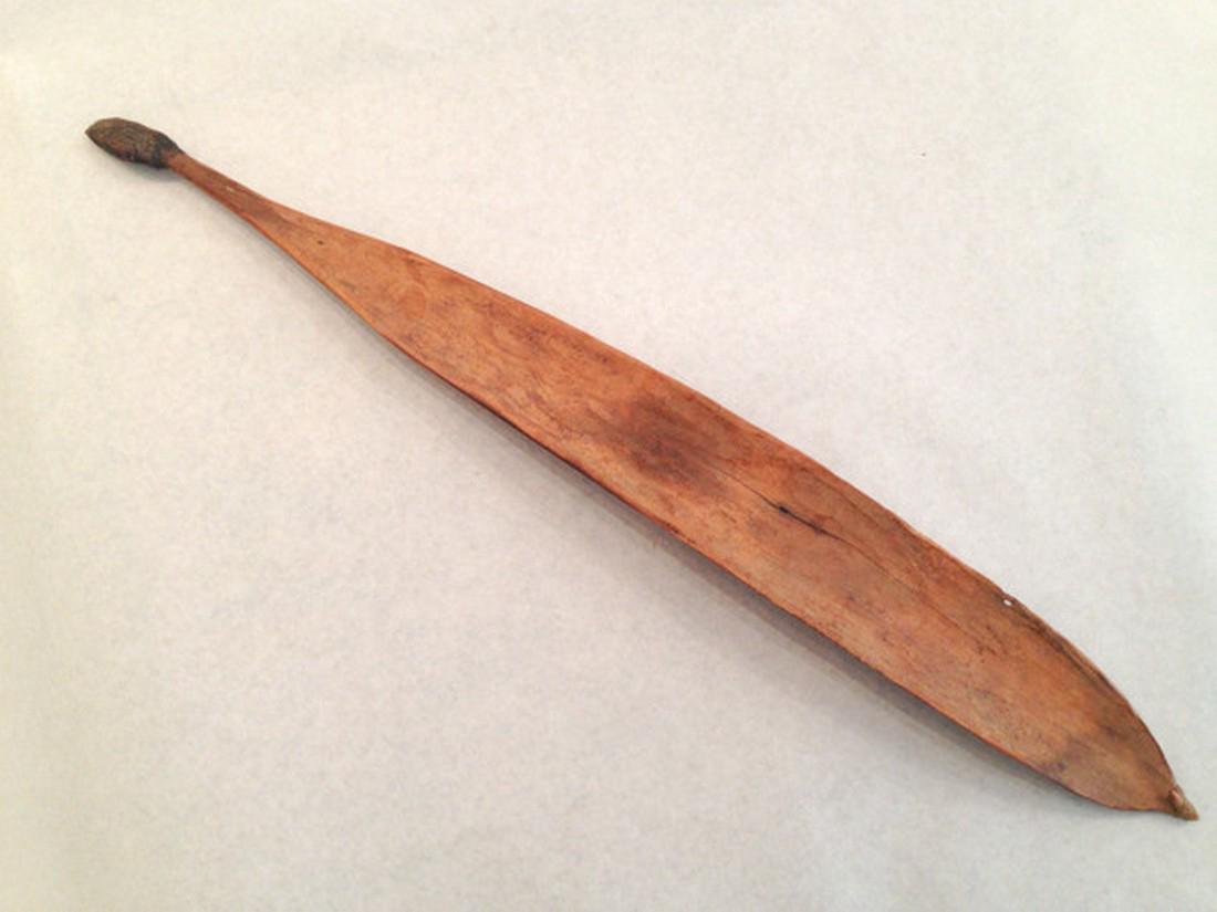 Old Aboriginal Woomera: Woomera showing age and extensive use. Peg intact, remnants of spinifex at base. The essential tool in every hunter's arsenal. 28 in. / 71 cm.Late 19th century / early 20th century