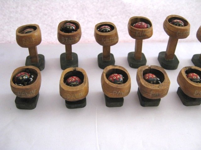 WOODEN CHESS , LADY BUG MOVING LEGS: A very rare and unusual old moving chess from post 1960 . The chess has lady bug in each piece and the legs keeps on moving for some time after you shake the piece . There are few pieces in which the