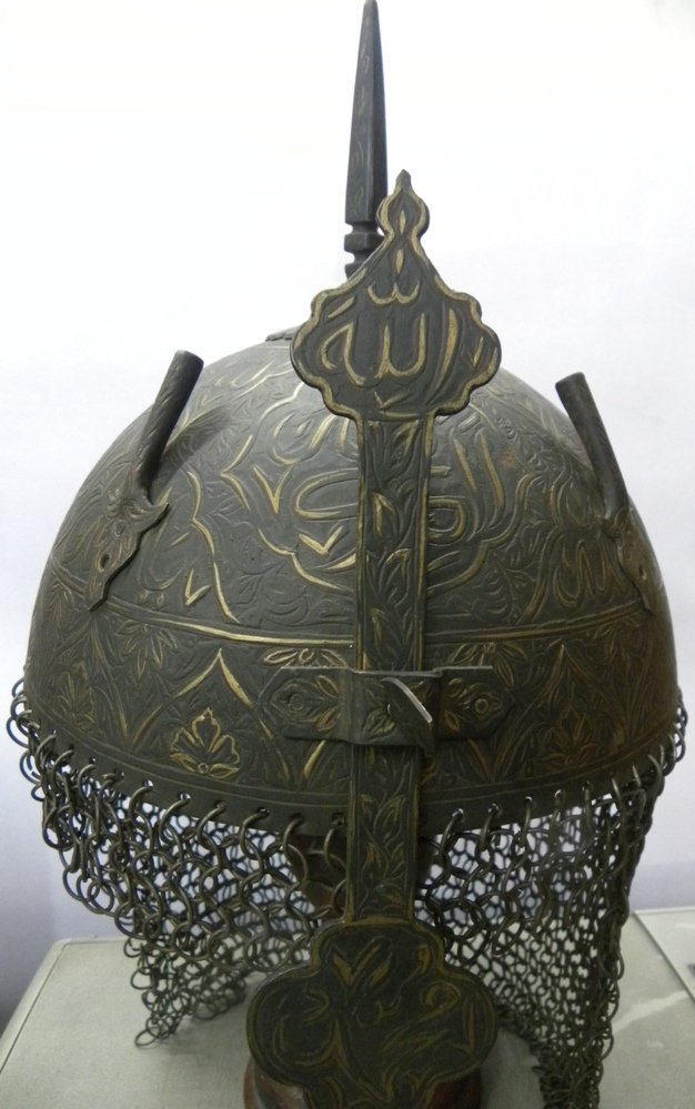 ANTIQUE PERSIAN WARRIOR HELMET MEDALLION ARABIC INSCRI: ANTIQUE PERSIAN WARRIOR HELMET MEDALLION ARABIC INSCRIPTIONProvince : . Made : Made of heavy iron , hand hammered and hand chisel. Skull : Hand engraved medallion, comprising of Arabic inscription to 