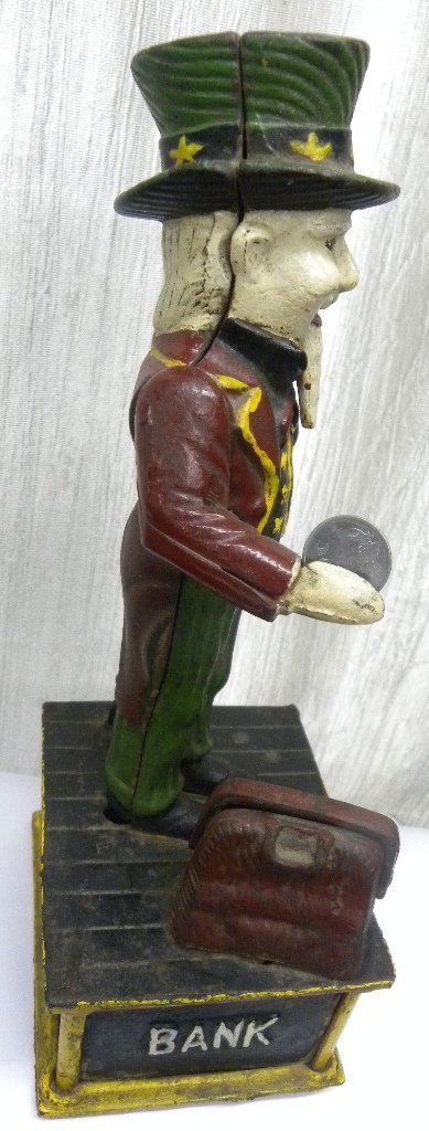ANTIQUE MONEY COIN  BANK AMERICAN COL. SAM FIGURE CAST (1 of 6)