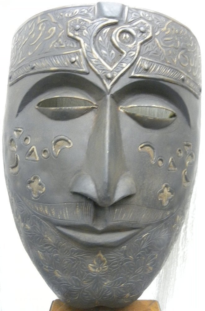 ANTIQUE INDO PERSIAN MASK ARABIC INSCRIPTION MUSTACHE: Indo Persian warrior face mask Arabic inscription on forehead.Made of heavy chiseled steel .Bread and mustache chiseled.Reverse of mask is well padded with cloth cushion.measuers : 9.42 inches high.