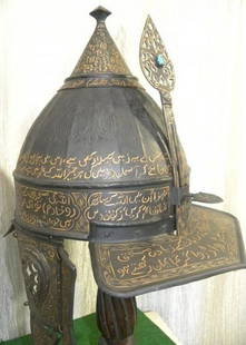 STUNNING WARRIOR MILITERY HELMET ARABIC INSCRIPTION & JEWEL: AMAZING MILITARY WARRIOR HELMET STUDDED WITH HIGHLY PRICES JEWEL. Arabic calligraphy engraved to invoke God's power and blessing to win battle. Affixed with Ear, neck & visor guards for safetyMade