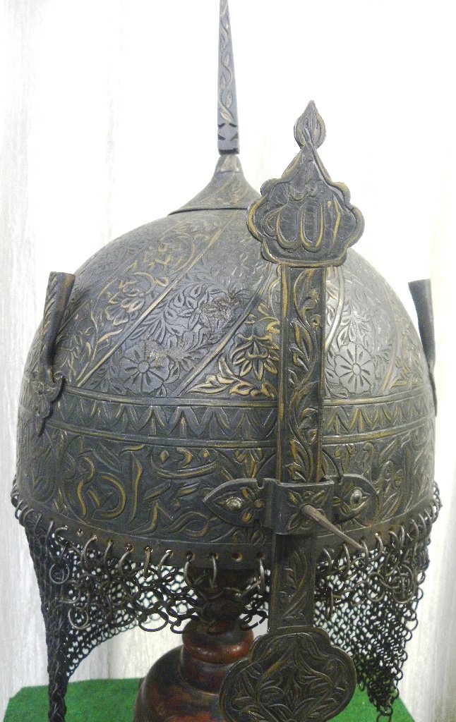 RARE MILITARY MUGHAL WARRIOR HELMET VINE BANDS ARABIC CALLIGRAPHY: HISTORIC MUGHAL/ PERSIAN WARRIOR HELMET VINE BANDS ARABIC INSCRIPTION. Province : Mughal / Persian. Documented : Documented in authentic war catalog & images can be seen at Google web site. Made : Mad