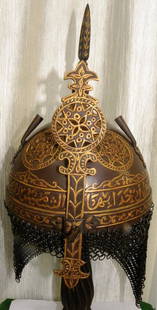 ARMOR MUSEUM LEVE PERSIAN WARRIOR HELMET (KULAH KHUD ) ARABIC INSCRIPTION E SURFACE FLORAL ENGRAVING: INCREDIBLE PERSIAN MILITRY WARRIOR HELMET UNUSUAL ROUND DESIGN . Province : Persian. Made : Hand forged steel , hand hammered and hand chiseled , skull made in one piece , the riveted crown Plate