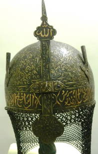 ARMOUR PERSIAN WARRIOR HELMET (KHULA KHUD) ARABIC INSCRIPTION SKULL LAVISH DENSE FLOWERS: ARMOUR AMAZING PERSIAN WARRIOR HELMET 9KHULA KHUD) A GEM OF COLLECTION. Make : Made of hand forged Hand hammered and hand chiseled. Arabic indcription: At bottom rim and top has hand engraved Arabic i