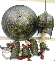 A SET OF 3 PIECE PERSIAN ARMOUR CHISELED & INLAYED HELMET (KULAH KHUD) SHIELD (SIPAR) & ARM GUARD