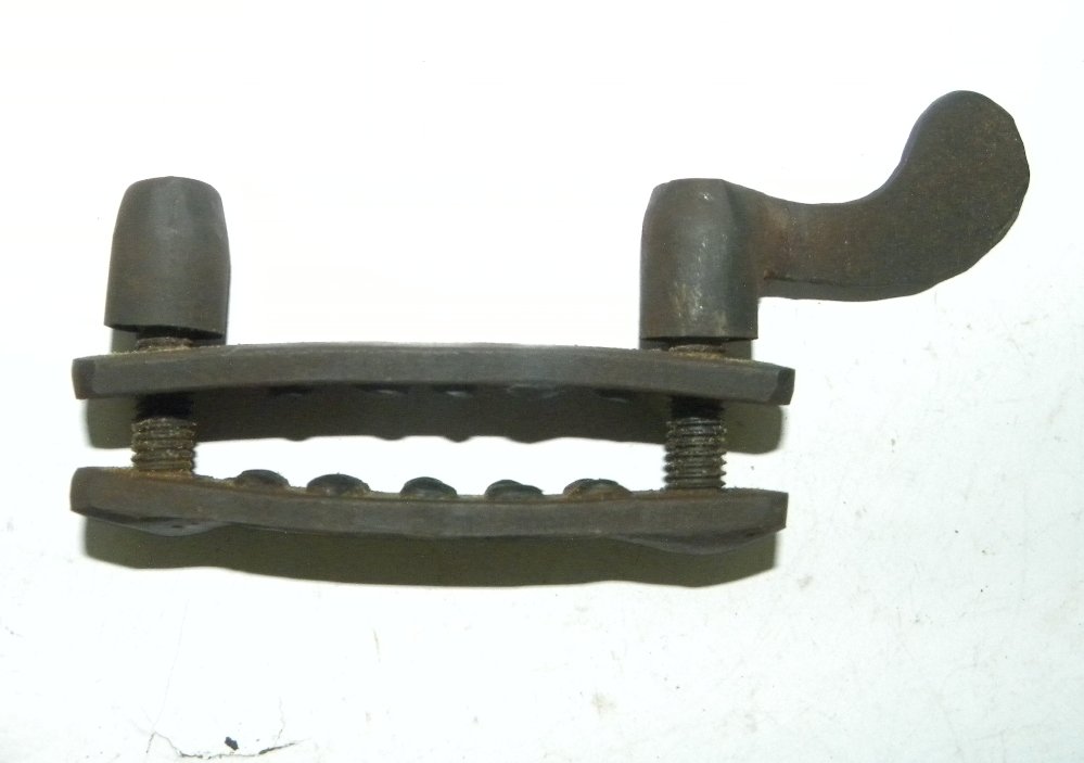 STEEL FINGER CRUSHER HAND FORGED WITH KEY: Steel finger crusher hand made with key to tighten. Fingers were insert inside two plates and tightened with key and as result gives too much of pain. Such device were used to torture who does anythin