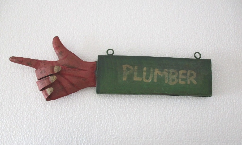 Plumber trade advertisement hand direction sign (1 of 8)