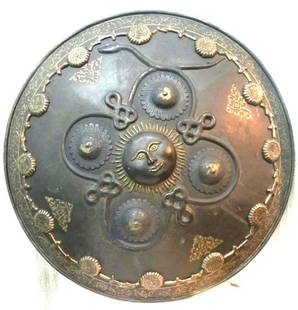 ARMOR MUSEUM LEVEL PERSIAN WARRIOR SHIELD SNAKE & SUN FIGS BRASS DECORATION: Province: Persian. . Made: Made of hand forged steel, hand hammered and hand chiseled. Central panel has Sun figure with Rays embossed. Border rim and some part of surface of shield bear an elaborate