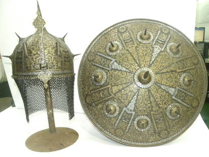 ANTIQUE ARMOR MUSEUM LEVEL PERSIAN STYLE  12 DAGGERS& 7 SPIKES IN SHIELD & HELMET: Made: Made of hand-forged steel, hand hammered and chiseled, engraved. Helmet Skull: Bears an elaborate chiseled engraving over its entire surface with floral, creepers design. The shield has 8 dagger