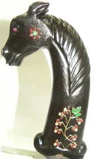 DAGGER HANDLES RARE ASIAN JADE DAGGER HANDLE HORSE SHAPE JEWELS STUDDED: Asian black Jade Dagger Handle, body formed in a Horse shape with head featuring beaded eyes. Horse Body both sides different INLAYED decorated with gems. Measures 13.5 centimeters. The bottom is slot
