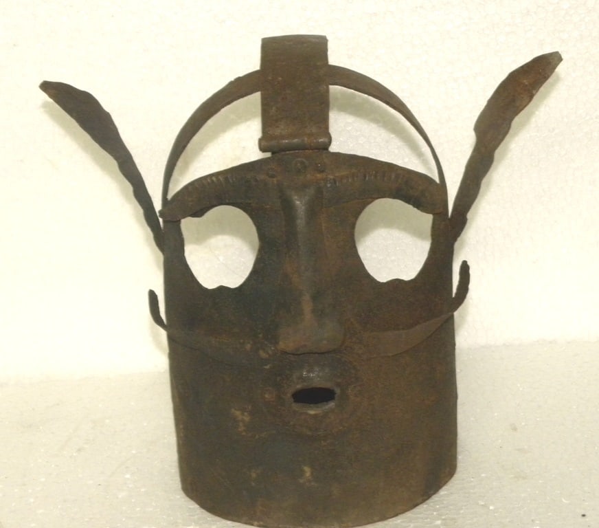BRANK SCOLDS BRIDLE SHAME MASK LONG EARS MUSTACHE STEEL HUMILIATION: Such iron masks were used in older times to punish person who does anything wrong in society. The mask has long ears and a mustache which would make the person wearing this mask more embarrassed. Such