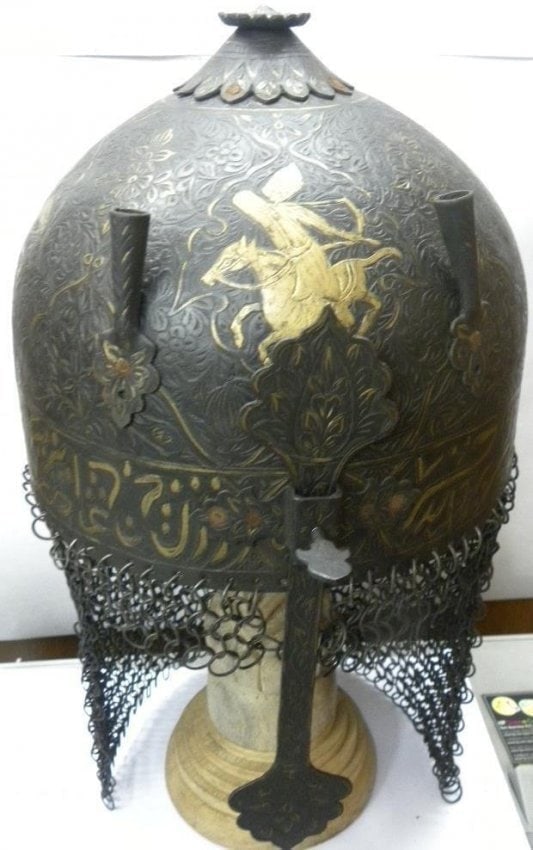 AUTHENTIC OLD STOCK HELMET 4WARRIORS ON HORSE WITH ARMOR BOTTOM TIM ARABIC INSCRIPTION: Incredible rare finding of unusual helmet. Made : Hand forged steel , hand hammered and hand chiseled , skull made in one piece , the riveted crown round with screw mounted. Nasal guard : The movable