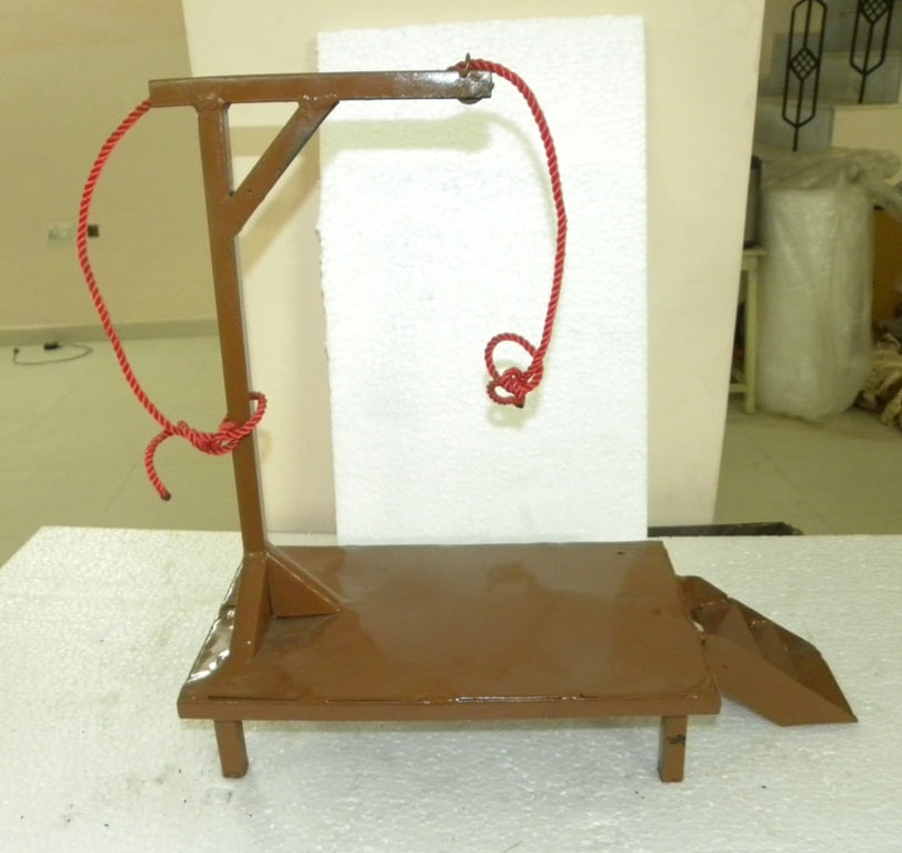 Your Home MUSEUM HANG TILL DEATH IN PUBLIC: Make museum in your home, newly made miniature replica of old hanging till death device hand made of steel. It has stairs and is high so maximum people could see in public.There is color difference in