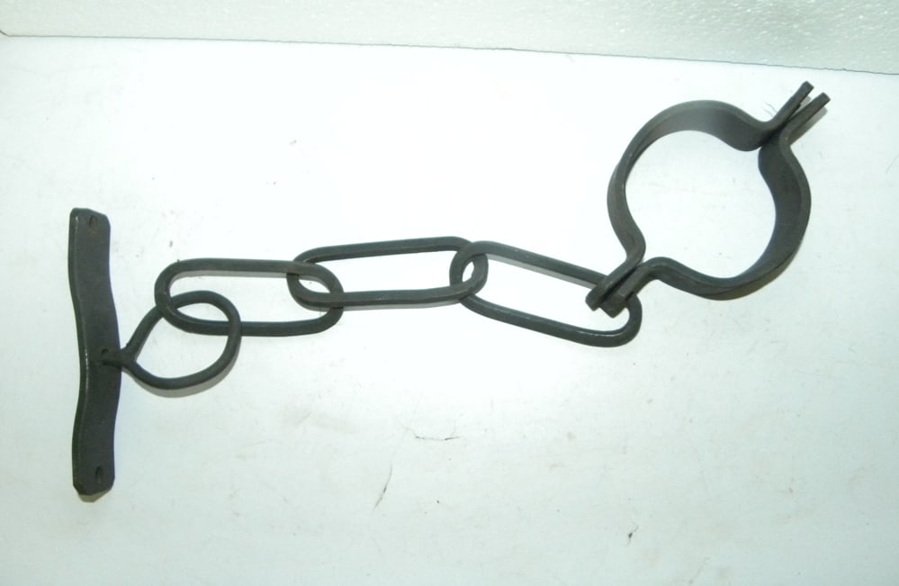 HANDMADE IRON HAND SHACKLE MADE FOR PRISONERS/SLAVES: One side was nailed in the wall (it has 2 holes in plate to nail) while the other side was used to tie (handcuff) the hand of the prisoner so that they won’t be able to escape. Such method was used