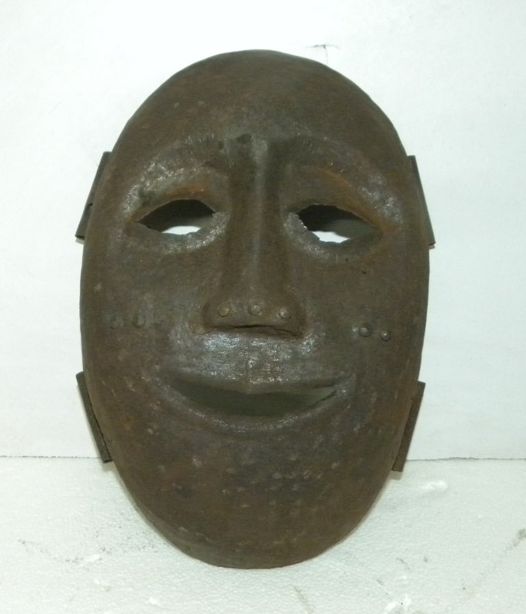 AFRICAN PUNISHMENT MASK FOR CRIMINAL HAND FROGED STEEL: Beautifully hand made steel mask. Looking to design looks like African mask.After making wear this mask was tied on pole or tree in public place so maximum passers could see him / her. It is a way to 