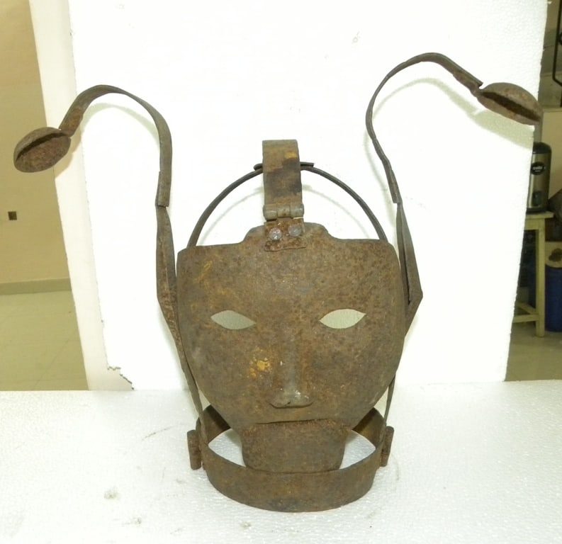 OLD PUNISHMENT MASK 2 LONG EARS STEEL: Beautifully hand made steel mask with two long ears is a symbol for punishment who does anything wrong. After making wear this mask was tied on pole or tree in public place so maximum passers could se