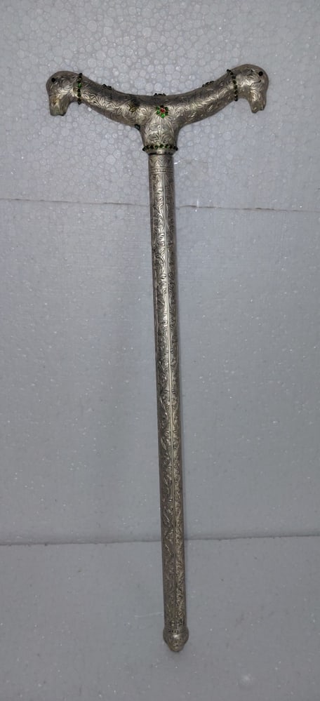 ROYAL WALKING STICK HAND CHISSELED GEMS SILVER PLATED ANIMAL HEAD: Product: Silver plated Walking stick with cane sward (blunt) inside Handle: Two animal head design with gem stones(semi precious) Work: Hand chiseled and gems Made: Hand made detailed work hand chisel