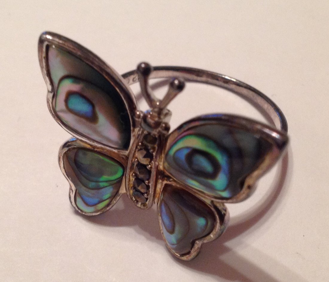 Estate Sterling Large abalone butterfly ring (S): Estate items. Marked 925. Sterling. Tested. Abalone butterfly ring. Size 11.5.