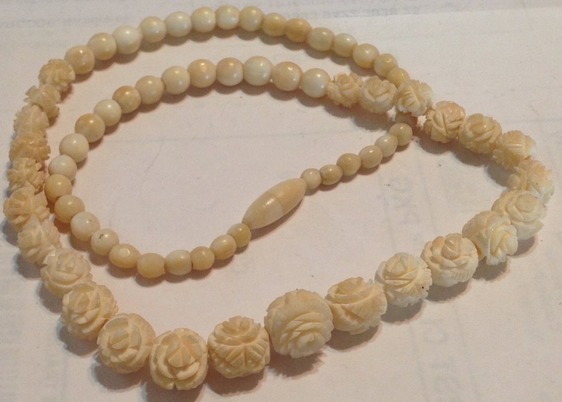 Estate vtg. Antique carved bone necklace.: Estate. Not marked.. Tested. Floral graduating carvings.