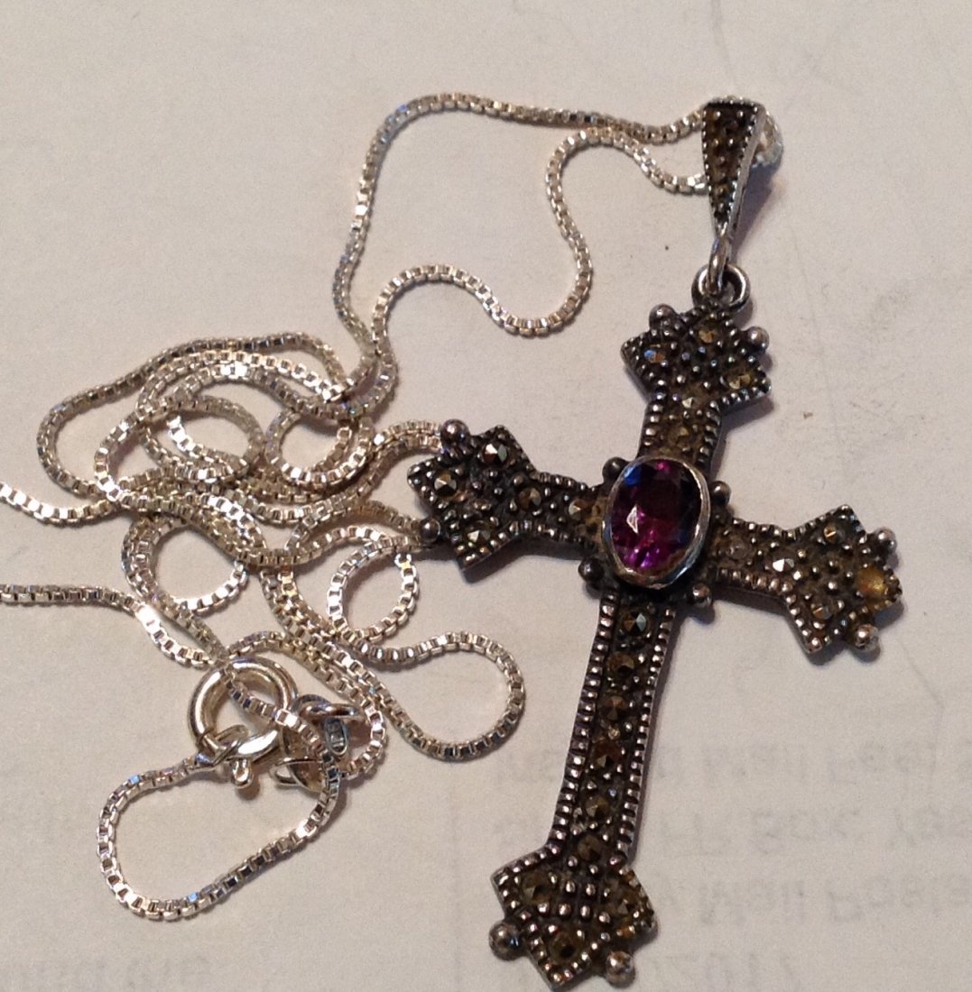 Vintage Sterling marcasite amethyst cross necklace (S): Estate item, fine jewelry. , tested sterling. Large amethyst cabochon. Noticed oneMarcasite chip dislodged.