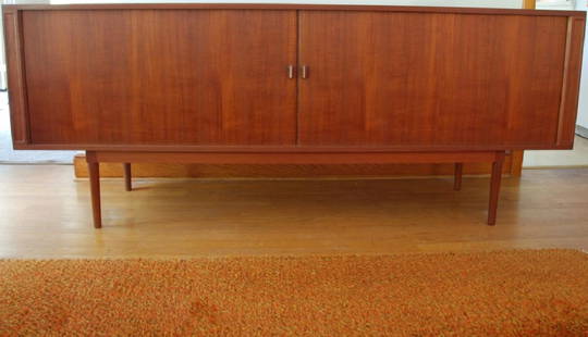 Jens H. Quistgaard Danish Tambour Credenza: Levig Design (Manufactured).. Danish Modern Tambour Door Credenza designed by Jens H. Quistgaard 1966 stamp on bottom. It has two tambour doors that open to three sections. The middle sections has