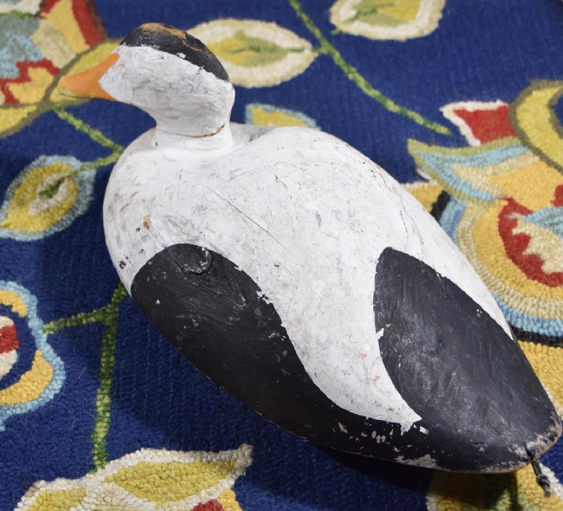 Monhegan duck decoy: Initials carved in bottom "MS". Title: Monhegan Duck. Medium: wood. Size: 6 x 16.50 x 8.50. Signature: Initials/Monogram. Artist: "MS" Carver. Unframed.