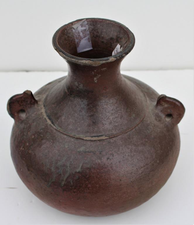 OLD CERAMIC JAR FROM SOUTHEAST ASIA, PROBABLY VIETNAM: Old Ceramic Jar from Southeast Asia Probably Vietnam Dark glazed ceramic jar from Southeast Asia probably Vietnamese type. Title: Old Ceramic Jar from Southeast Asia. Size: 8.5 X 75 in.