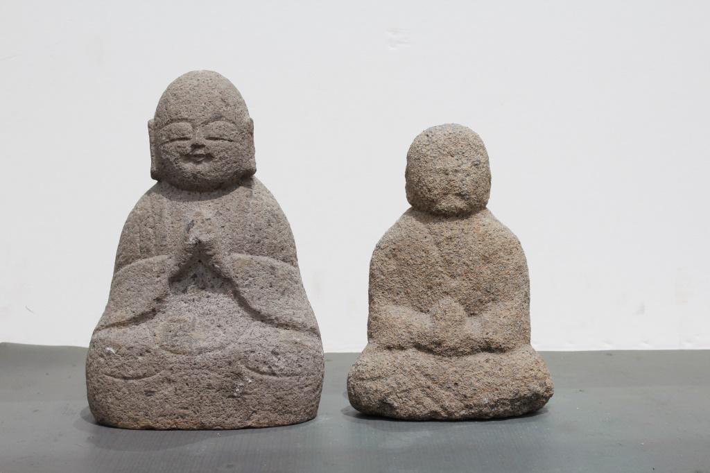 Old Stone Buddhist Statues of the Buddha: A pair of old lime stone statues of buddha probably from Southeast Asia, probably Cambodia or Vietnam. Title: Buddha Stone statues. Medium: stone. Size: 11 x 7.5 x 4.5, 9.5 x 7 x 3.5 in. Signature: Un