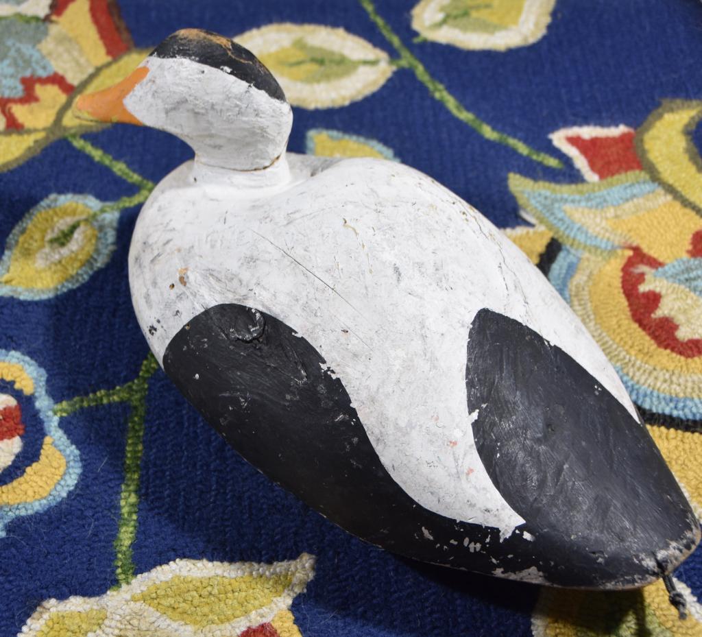 Monhegan duck decoy: Initials carved in bottom MS. Title: Monhegan Duck. Medium: wood. Size: 6 x 16.50 x 8.50 in. Signature: Initials/Monogram. Artist: MS" Carver". Unframed.