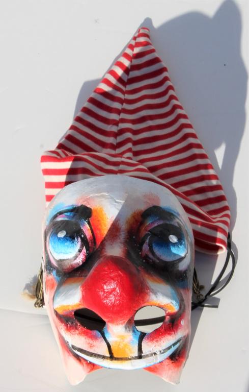 Swiss Fasnacht Mask with cap: Swiss Fasnacht Mask with cap. Festival mask with cap. Swiss Fanacht papier mache mask for fife and drum - Basel.. Title: Festival mask with cap.. Medium: Paper Mache. Size: 8 X 6.5 X 8 in. Unframed.