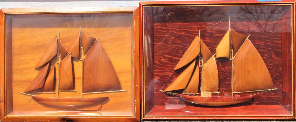 Pair of I/2 Wooden Ship model under glass: Pair of I/2 Wooden Ship model under glass. Pair of 1/2 wooden ships under glass. Title: I/2 Wooden Ship model under glass. Medium: Wood. Size: 16.50 x 21.50 15.75 x 19.50 in. Signature: Stamp on one v