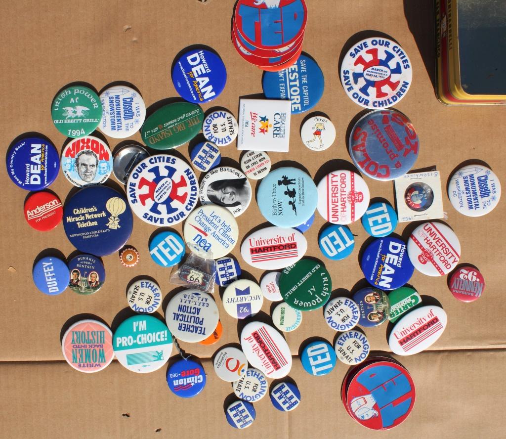 Box of political pins: Box of political pins. Assorted pins. Title: Tin of Political pins. Medium: metal. Size: assorted in. Unframed.