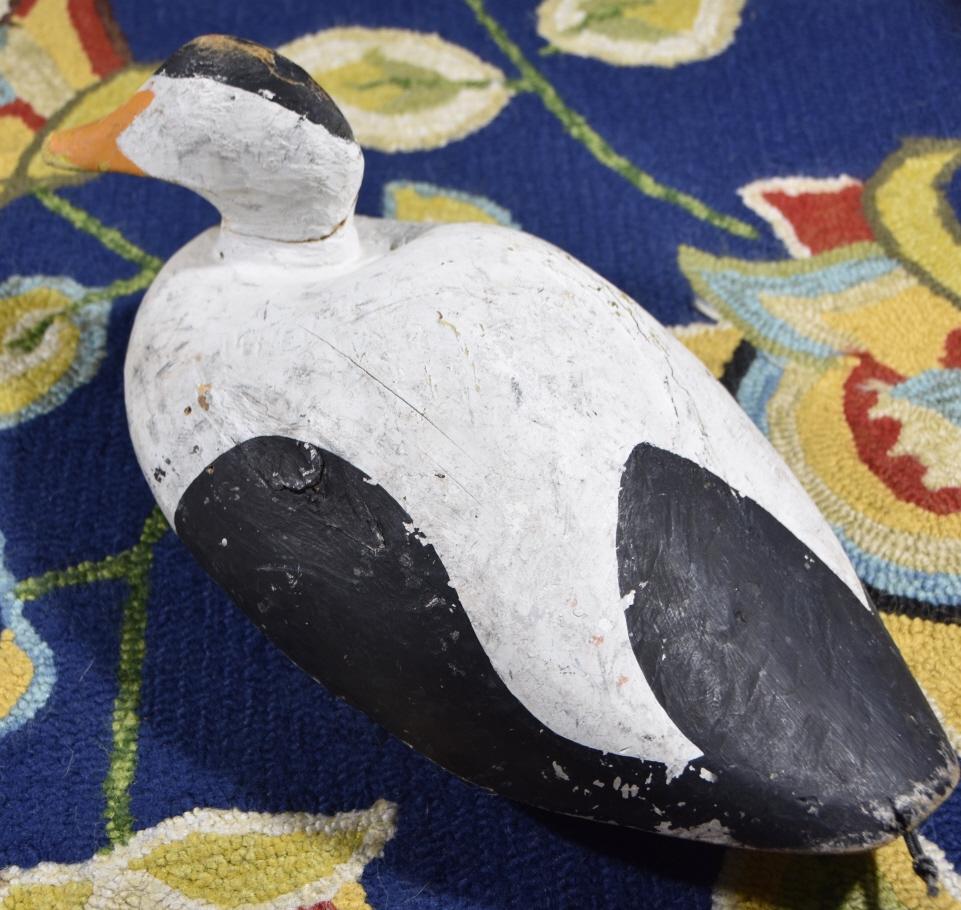 Eider duck decoy, Monhegan: Eider duck decoy, Monhegan. Initials carved in bottom MS". Title: Eider Duck Decoy. Medium: wood. Size: 6 x 16.50 x 8.50 in. Signature: Initials/Monogram. Artist: MS" Carver". Unframed.