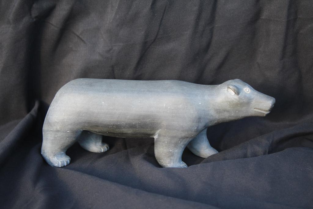 Pair of Inuit (Polar Bear and Whale): Pair of Inuit (Polar Bear and Whale). 1) Inuit Polar Bear. Polar Bear E91733. Title: Inuit Polar Bear. Size: 3.5 X 8 X 2.25 in. 2)Inuit Whale. Size: 1.25 X 4 X 2 in. Title: Pair of Inuit (Polar Bear a