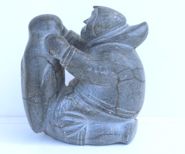 Inuit by Daniel: Inuit by Daniel. . Title: Man with owl. Size: 7 x 6.5 x 4.5 in. Unframed.