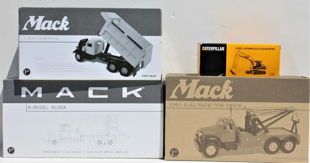 4 replica construction Vehicles toys. . (1 of 3)