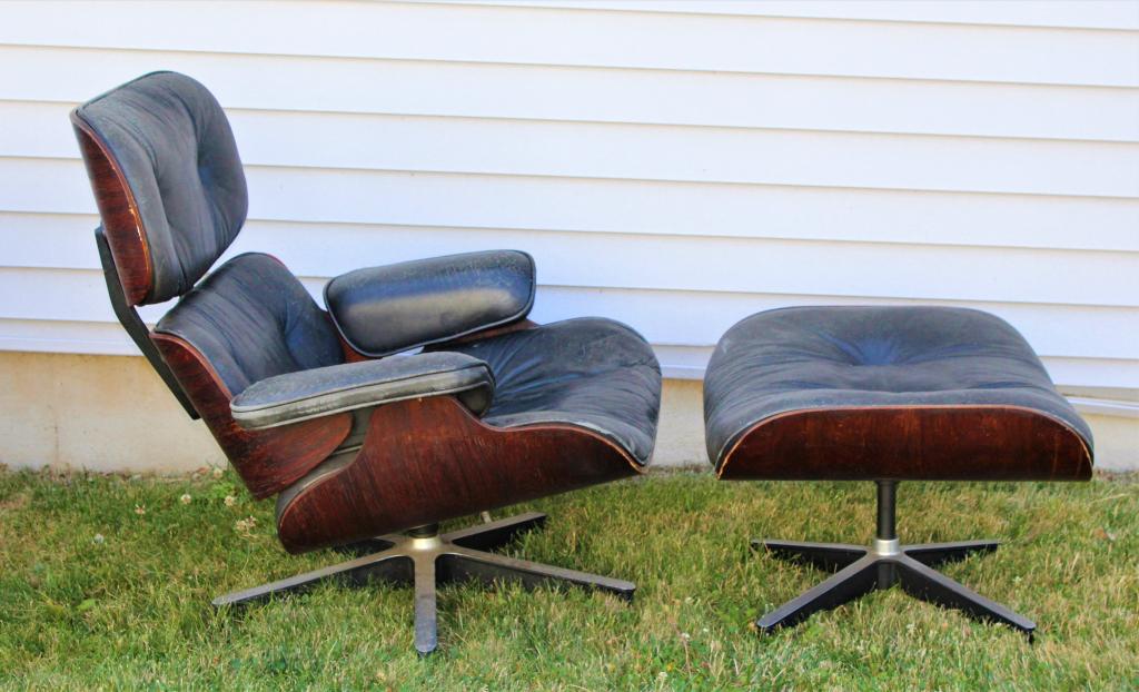 Charles & Ray Eames lounge chair and ottoman: Charles & Ray Eames lounge chair and ottoman. . Title: Louge chair 670 and ottoman 671. Signature: Label on bottom. Artist: Charles & Ray Eames. As Is.