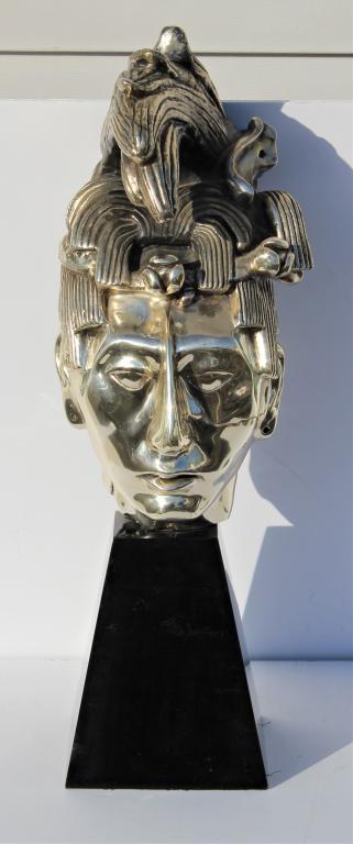 Mexican Head: Mexican Head. 22.5 Height with base. Title: Mexican Head. Medium: Metal. Size: 15 x 7.5 x 7.5 in. Unframed.