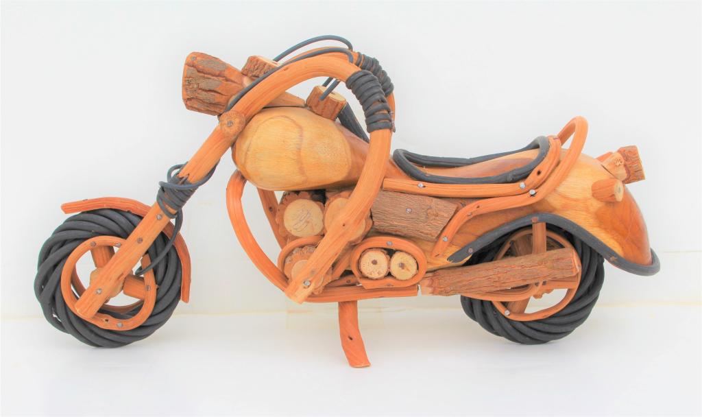 Wooden Harley Davidson Motorcycle: Wooden Harley Davidson Motorcycle.Title: Wooden Harley Davidson Motorcycle. Medium: Wood. Signature: Initials/Monogram.The dimensions are 6 x 12 x 3.5 inches.