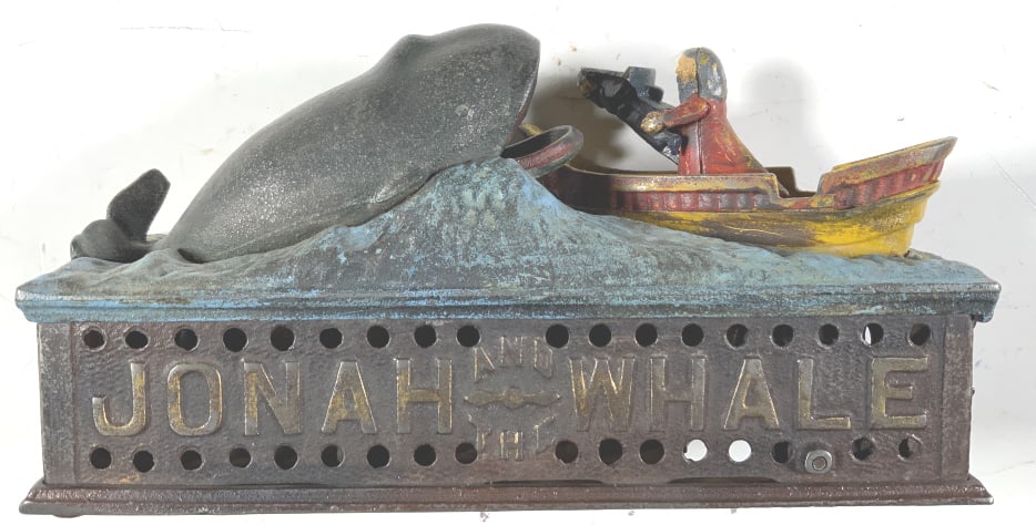 CAST IRON BANK, Jonah and the Whale: CAST IRON BANK, Jonah and the Whale. . Title: JONAH AND THE WHALE. Medium: Cast iron. Size: 5.25 x 10 x 3.50 in.