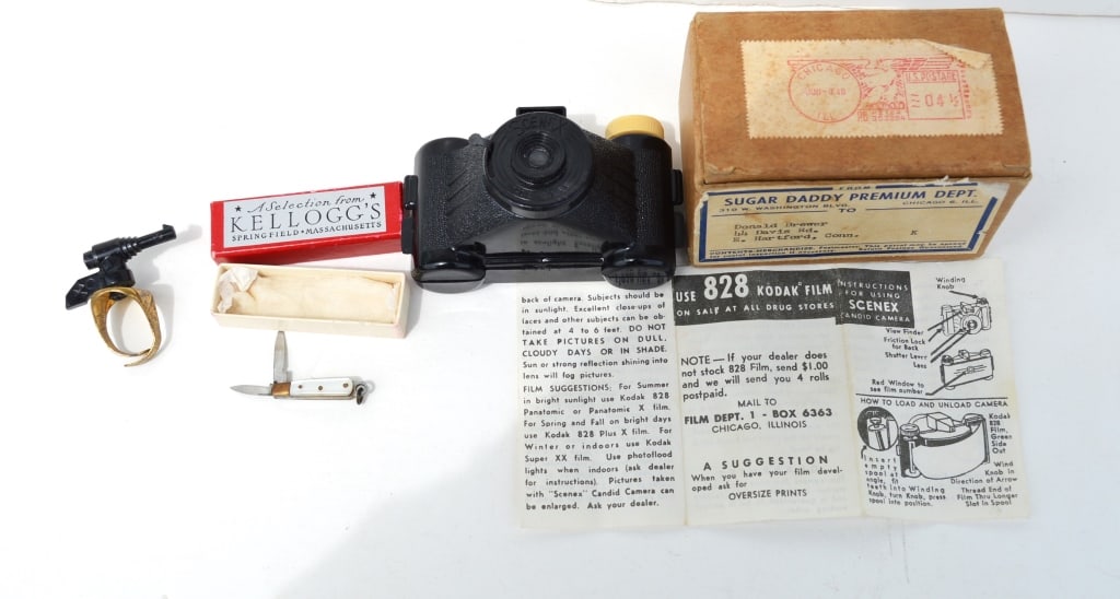 Vintage toy items: Vintage toy items. Camera, pistol ring, small German made knife. Title: Vintage toy items.