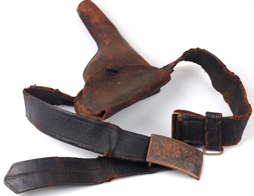 INDIAN WAR Officer's Eagle Belt Plate Leather BELT HOLS: ORIGINAL OFFICER'S EAGLE BELT PLATE, BELT AND HOLSTER. Circa 1880s pistol belt with holster. Belt features a late Model 1851 officer's belt plate with keeper. Holster also features to the 1880s and is