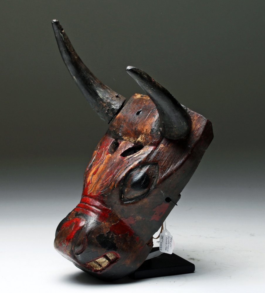 Guatemalan El Torito Dance Mask: Central America, Guatemala, ca. 1960 CE. The bull is a popular subject of Guatemalan masquerades featured in the Torito (Little Bull) Dance, the Patzcar Dance, and others. This example is wonderfully 