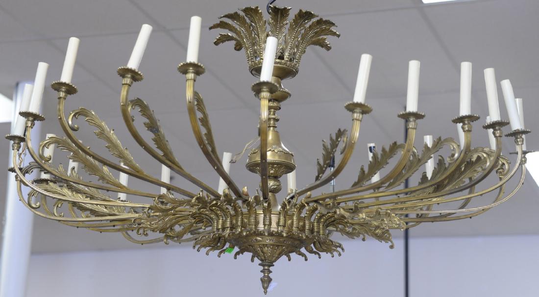 Large twenty-four light brass chandelier having (1 of 3)