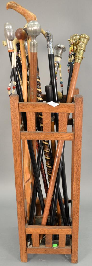 Mission Oak umbrella older now with fifteen canes.: Mission Oak umbrella older now with fifteen canes.