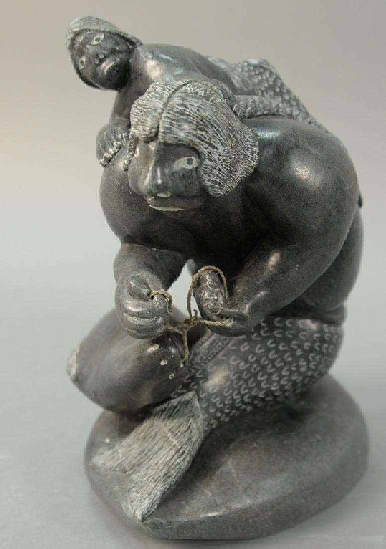 Inuit Eskimo carving, Sakariasie Napatuk (1928),: Inuit Eskimo carving, Sakariasie Napatuk (1928), Akulivik, Sedna with Child black soapstone on pedestal. ht. 12in., pedestal ht. 36in.
