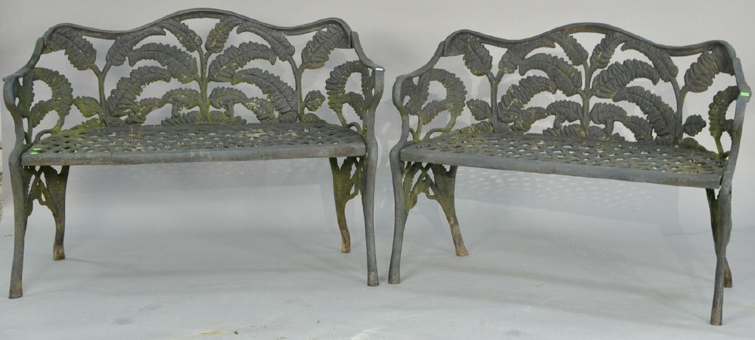 Pair of iron benches with fern motif, one marked (1 of 4)