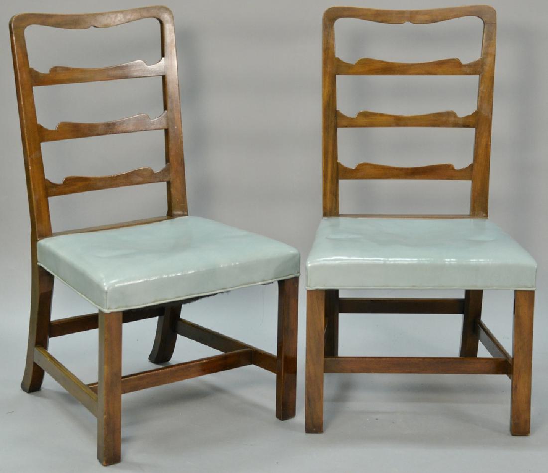 Set of eight mahogany ribbon back side chairs all with: Set of eight mahogany ribbon back side chairs all with full upholstered leather seats, Kittinger Colonial Williamsburg stamp (one seat torn).