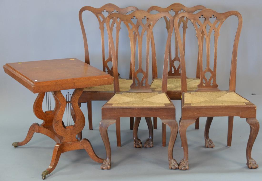 Five piece lot including Contemporary table with harp: Five piece lot including Contemporary table with harp Duncan Phyfe style base and four Chippendale style rush seat chairs.